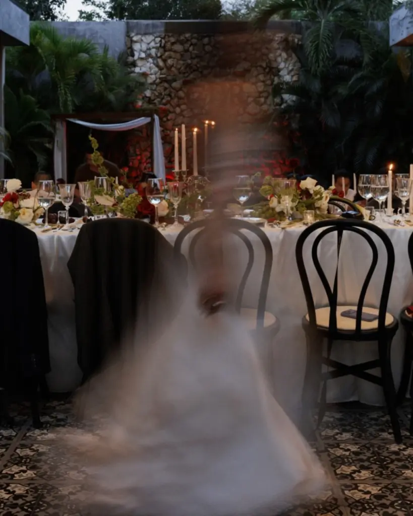 International wedding guests attending an open-air destination wedding at a private PBhomes villa in Tulum